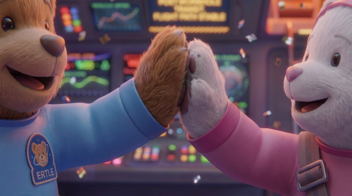 Ertle and Luna high-fiving at the cockpit console